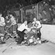 The extremely good original AP caption: “Officials strain to pull Detroit Red Wing forward Ted Lindsay off an unidentified Toronto Maple Leafs player in a squirmish during the third period of a game two playoff matchup at the Detroit Olympia on March 30, 1950 in Detroit, MI.”